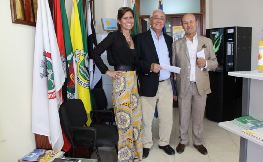 Entrega Voucher à Casa Caravela